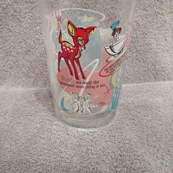 Vtg DISNEY World 100 Years of MAGIC Drinking GLASS Atomic Starburst HATTER Bambi - Picture 1 of 10